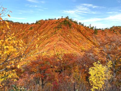 下台倉山に落ちた太陽（平ヶ岳）